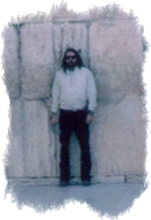 Photo of me standing in front of the Western or Wailing Wall in Jerusalem linking to a photo album of my 1986 trip to Israel